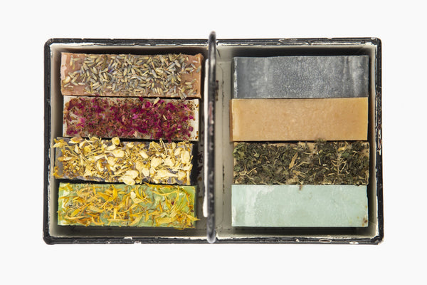A Metal rustic Tray with 8 Organic Luxurious Moroccan Casablanca Soap Topped with Herbs and Flowers  Edit alt text